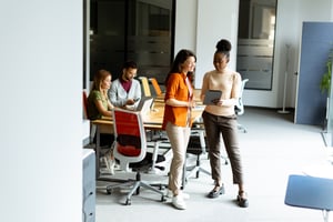 two-young-business-women-with-digital-tablet-in-th-2023-11-27-05-33-40-utc